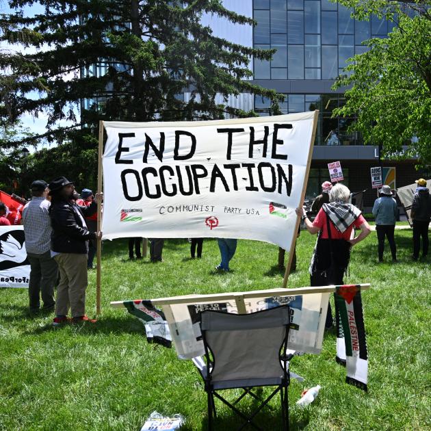 End the occupation banner