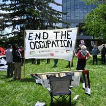 End the occupation banner