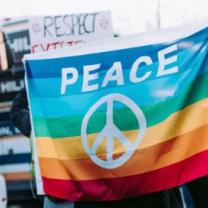 Peace sign on rainbow flag